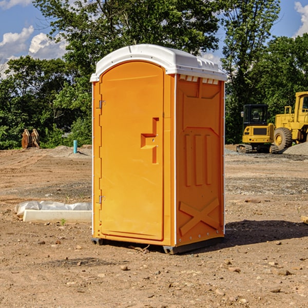 how often are the porta potties cleaned and serviced during a rental period in Usk